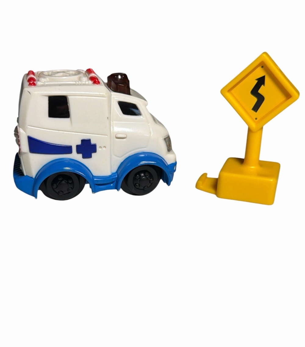 Fisher Price 2006 GeoTrax Rail & Road System Bright Beams Ambulance w/ Road Sign